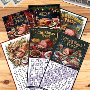 May include: Several Christmas-themed cards with illustrations of festive feasts, including ham, turkey, and various side dishes. Each card features the text "Christmas Feast" and a grid of squares. US currency and a calculator are also visible.