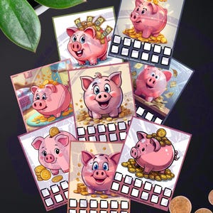 May include: A collection of illustrated cards featuring pink piggy banks surrounded by coins and money. Each card has a different design, with the text "Savings Challenge by MHFinland/@PRMoneyRoll" at the bottom. The cards are arranged on a dark surface.