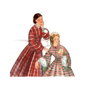 May include: Two women in vintage dresses. The woman on the left is wearing a red and black plaid dress. The woman on the right is wearing a pink and green striped dress with a white lace collar.