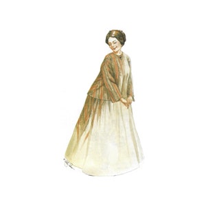 May include: A woman in a long, cream-colored dress with a brown, green, and orange patterned jacket. She is looking down and smiling.