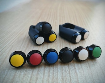 Motorcycle handlebar control buttons