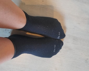 Socken, getragen, schwarz