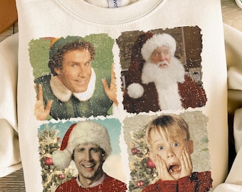 Könnte beinhalten: Cremefarbenes Sweatshirt mit vier Panels, die Charaktere aus Weihnachtsfilmen zeigen. Die Panels zeigen Buddy den Elfen, den Weihnachtsmann, Clark Griswold und Kevin McCallister. Das Sweatshirt wird mit blauen Jeans und einem beigen Hut kombiniert.