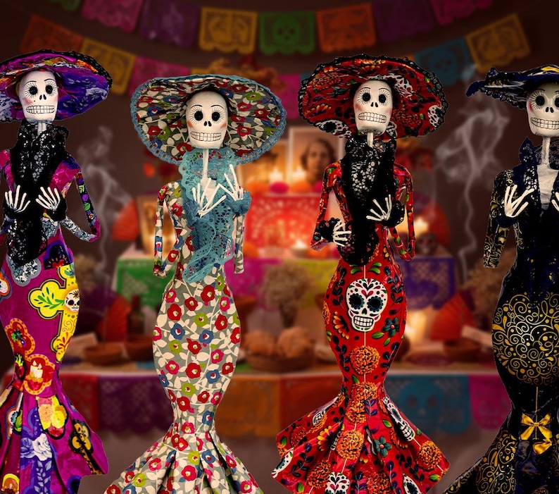 May include: Four skeletal figurines dressed in vibrant, patterned gowns and wide-brimmed hats. Each figure features a white skull face with painted details, black lace accents around the neck, and long, fitted dresses with colorful floral and skull motifs.