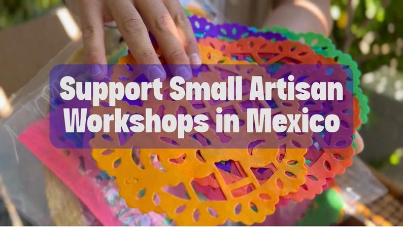 May include: A stack of circular, multi-colored paper cutouts featuring intricate, perforated patterns in orange, purple, green, and pink. The text 'Support Small Artisan Workshops in Mexico' is overlaid in white on a purple rectangular background.
