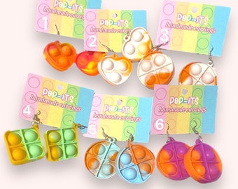Pendientes Pop it: Pendientes de juguete Pop-it Fidget de formas y colores surtidos