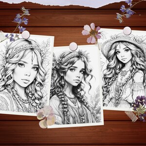 May include: Three black and white illustrations of women with long flowing hair, each wearing a different style of headwear. The woman on the left is wearing a crown of leaves, the woman in the middle is wearing a floral headband, and the woman on the right is wearing a wide-brimmed hat.