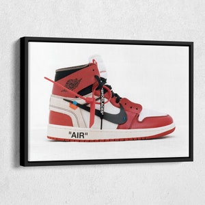May include: A white and red high-top sneaker with a black swoosh and the text "AIR" and "SHOELACES" on the side.