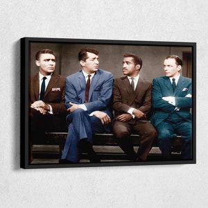 May include: Four men in suits sitting on a bench. The man on the left is wearing a brown suit, the man in the middle is wearing a blue suit, the man to his right is wearing a brown suit, and the man on the right is wearing a blue suit.