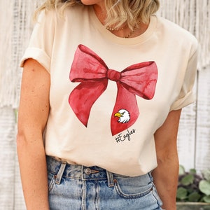 Camiseta de fútbol con lazo de mascota: Camiseta coqueta con espíritu escolar