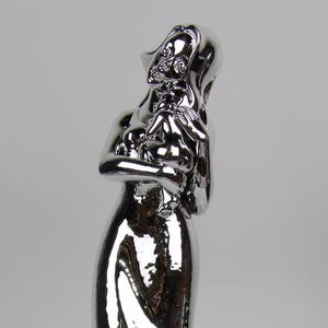 Silver-Coated Resin Sculpture of Woman Posing - Elegant and Timeless Decor