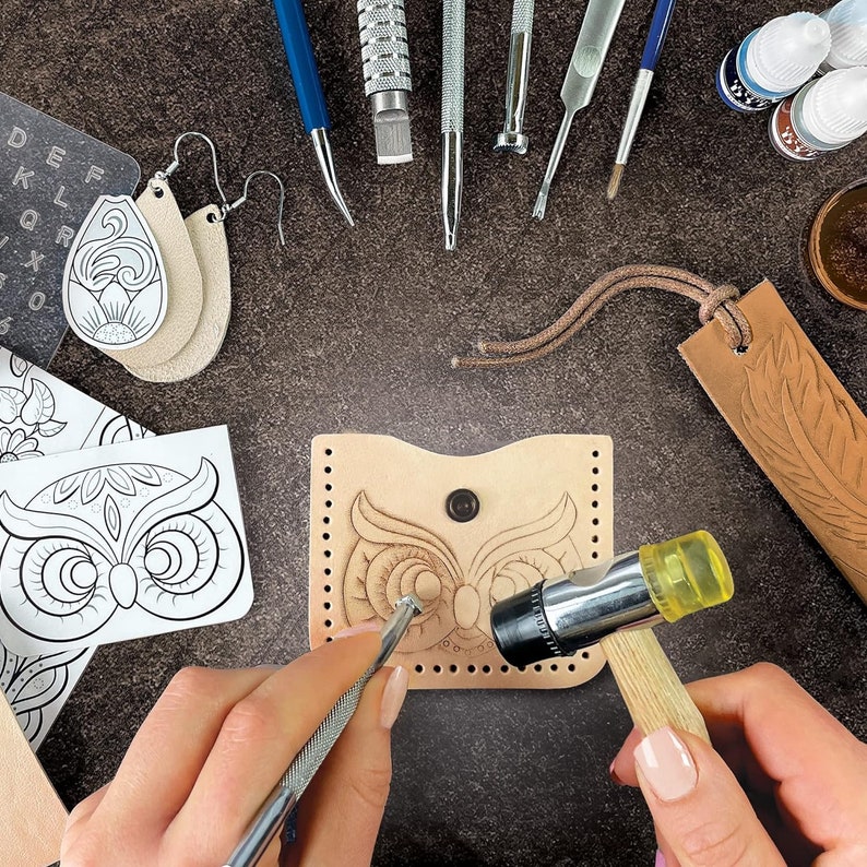 May include: A leather craft kit with tools, patterns, and a leather piece with an owl design being embossed. The kit includes a hammer, a leather punch, a stitching tool, and a leather awl.