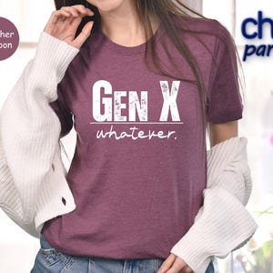a woman wearing a t - shirt that says gen x whatever