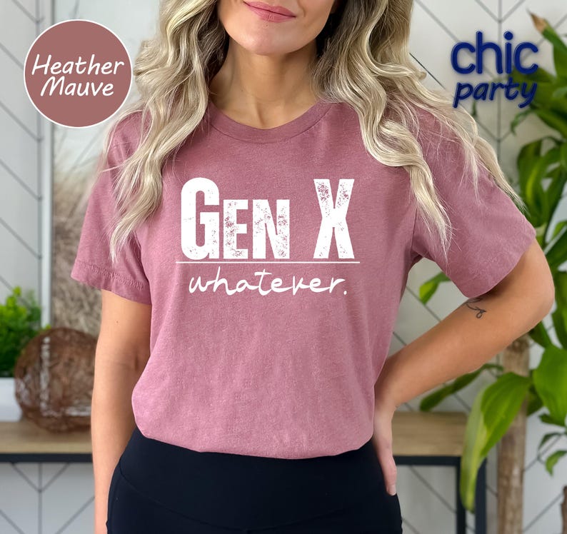 a woman wearing a pink gen x whatever t - shirt