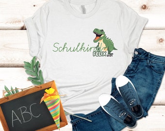 T-shirt Schoolchild 2024 personalizzata, Dino Fan, T-shirt Schoolchild. Maglietta personalizzata per l'iscrizione a scuola. Primo giorno di scuola