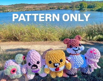 May include: A collection of colorful, crocheted plush toys, including a sea turtle, octopus, and a character resembling SpongeBob SquarePants. The text "PATTERN ONLY" is displayed across the top. The toys are held against a backdrop of a lake and blue sky.