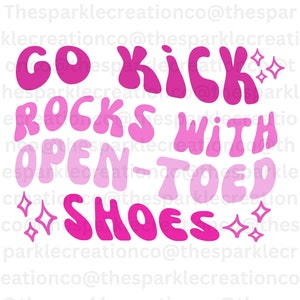 May include: Pink and white graphic text design with the words "GO KICK ROCKS WITH OPEN-TOED SHOES" in a retro style with sparkling stars.