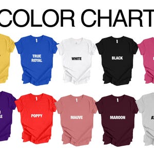 May include: A color chart displays various t-shirt colors. The shirts are in shades of yellow, true royal, white, black, berry, team purple, poppy, mauve, maroon, and solid athletic grey. The text "COLOR CHART" is at the top.