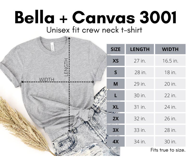 May include: A light gray Bella + Canvas 3001 unisex fit crew neck t-shirt. The image includes a size chart with measurements in inches for sizes XS to 4X. The shirt is paired with denim shorts and a sprig of dried grass.