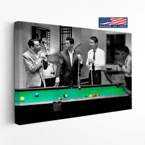 May include: Black and white canvas print featuring a vintage image of men playing pool. The pool table has a green felt surface with colorful billiard balls. The image includes the text "MADE IN USA".