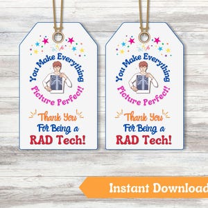 May include: Two white gift tags with a blue border and a string. Each tag has a cartoon of a person with an X-ray, surrounded by text that reads "You Make Everything Picture Perfect!" and "Thank You For Being a RAD Tech!"
