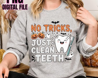 May include: A grey sweatshirt with a Halloween graphic. The design includes the text "NO TRICKS, JUST CLEAN TEETH" with pumpkins, ghosts, a smiling tooth, and a toothbrush. The words "PNG DIGITAL FILE" are in the upper left corner.