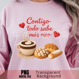 May include: Pale pink sweatshirt featuring the Spanish phrase "Contigo todo sabe más rico" in red script, with crocheted coffee and pastries. The image also includes the text "PNG DIGITAL FILE Transparent Background".