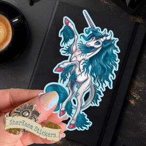 Blue Haired White Unicorn Tattoo Flash Art Sticker Nostalgia Eighties Unicorn Artwork Monoceros Einhorn 80’s Anime Movie Old School Unicorns