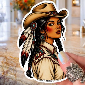 May include: A sticker depicting a woman in a cowboy hat and Native American-style jewellery. She has dark, braided hair, red blush, and a tan shirt with patterns. The sticker includes the text "SharkasmStickers".