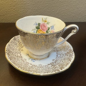 Vintage Queen Anne Bone China Tea Cup & Saucer - gold with Rose