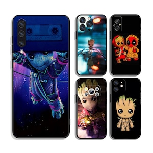 May include: Collection of black phone cases featuring various designs of the character Groot from Guardians of the Galaxy. One case has a cassette tape design, while others showcase Groot in different poses and styles.