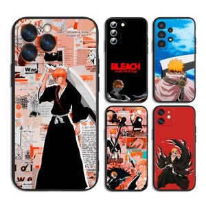 May include: A collection of phone cases featuring anime-style artwork. Designs include a character in a black outfit with a large sword, the word "BLEACH" in red, and other colorful illustrations. The cases are in various colors.