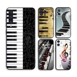 May include: Set of six phone cases featuring different piano keyboard designs. The cases have black backgrounds and feature various piano keyboard designs, including a black and white keyboard, a vintage keyboard, a keyboard with musical notes, and a keyboard with a treble clef.