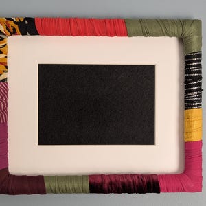 Marco de fotos hecho a mano forrado en tela