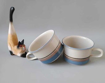 UHTUA Arabia Finland - SET of 2 Mocha Coffee Cups - Inkeri Leivo (decoration), Ulla Procope (model) - 1982-1999