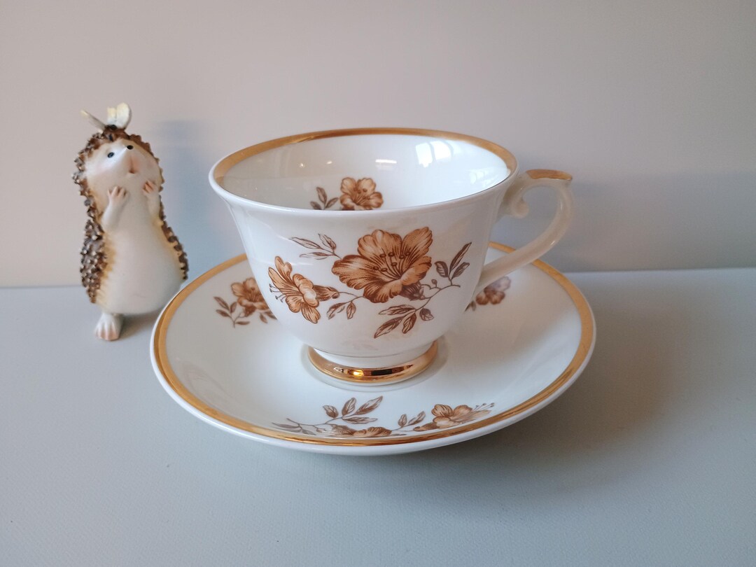 Myrna Arabia Finland Coffee Cup and Saucer - Olga Osol Floral