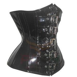 May include: Black patent leather corset with silver buckles and lacing in the back.