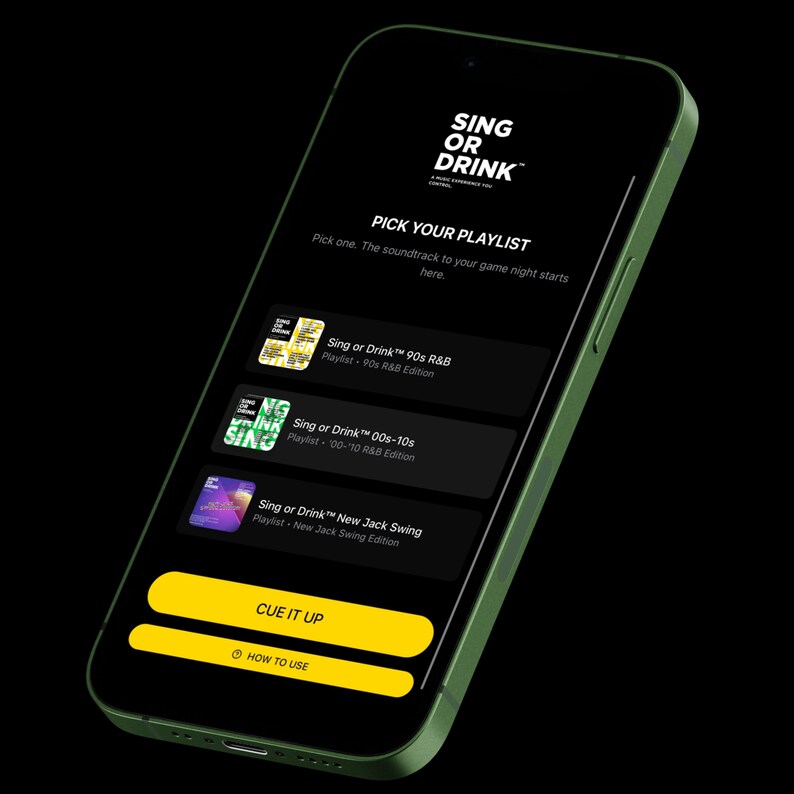 May include: A green smartphone displays the "Sing or Drink" app interface. The screen shows playlist options: 90s R&B, 00s-10s, and New Jack Swing. A yellow button reads "Cue It Up". The app's tagline is "A music experience you control."