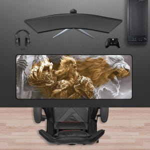 May include: A gaming setup featuring a curved monitor, headset, and a desktop computer. A large rectangular mousepad displays a detailed illustration of a warrior and a lion. A black gaming chair is positioned below the desk.