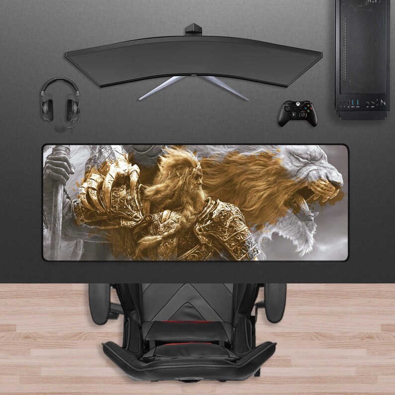 May include: A gaming setup featuring a curved monitor, headset, and a desktop computer. A large rectangular mousepad displays a detailed illustration of a warrior and a lion. A black gaming chair is positioned below the desk.