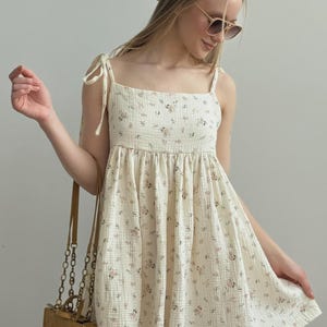 Milky white muslin mini dress with rose print, tie-strap sundress, summer cottagecore outfit
