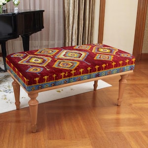 Red bohemian rug bench with tribal diamond pattern, perfect for entryway seating or boho living room accent, vibrant and unique decor touch