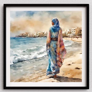 May include: A watercolor painting of a woman in a blue and pink patterned dress and headscarf walking on a sandy beach. The ocean is behind her with white waves crashing on the shore. There are buildings in the distance.