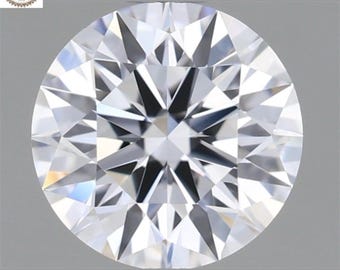 May include: A round, brilliant-cut diamond with numerous facets, reflecting light. The diamond is colorless and appears to be of high clarity, with sharp, well-defined edges. The image is a close-up, showcasing the diamond's intricate design and sparkle.
