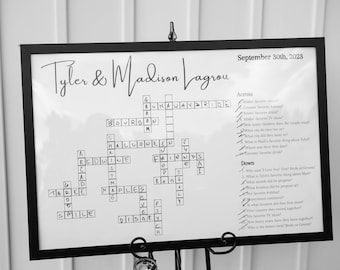 Puede incluir: Un crucigrama en blanco y negro con los nombres Tyler & Madison Lagrou en la parte superior. El crucigrama está enmarcado y tiene una lista de pistas en el lado derecho. La fecha 30 de septiembre de 2023 está impresa en la esquina superior derecha.