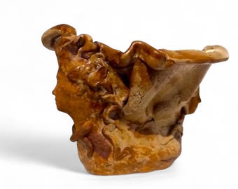 Handmade vintage stoneware bowl with women’s faces and unique glaze