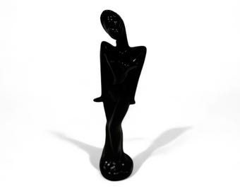 art deco black statue of a woman