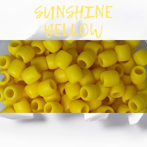 Silicone Hair Beads in the color Sunshine Yellow