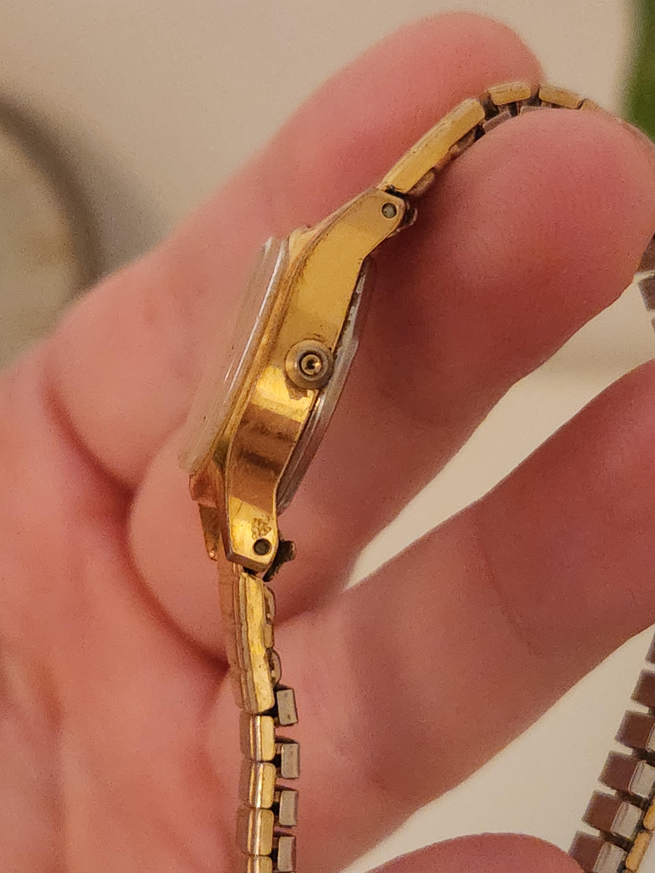 Vintage Timex Q K Cell Ladies Gold Tone Oval Analog Quartz 