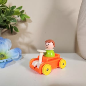 Vintage Fisher Price Little People - Little Riders Orange Car with Green Body Dress Girl Figure / Character